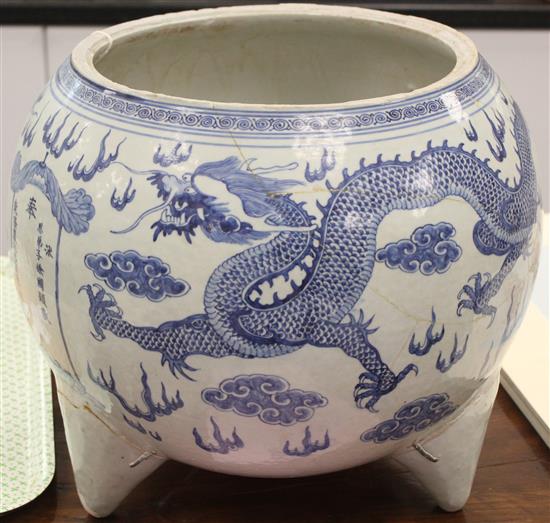 A massive Chinese blue and white dragon tripod censer, Qianlong mark and of the period (1736-95)